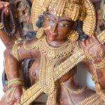 Discover Tranquility with our Hand Wood Carved Saraswati Statue