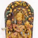 wood krishna idol