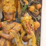 wood krishna idol