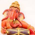 Hand-Carved Wooden Musical Lord Ganesha Statue (24 Inches) – Saffron Ganpati Playing Dholak | Handmade Wooden Ganesh Idol - Image 2