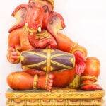 Hand-Carved Wooden Musical Lord Ganesha Statue (24 Inches) – Saffron Ganpati Playing Dholak | Handmade Wooden Ganesh Idol - Image 3